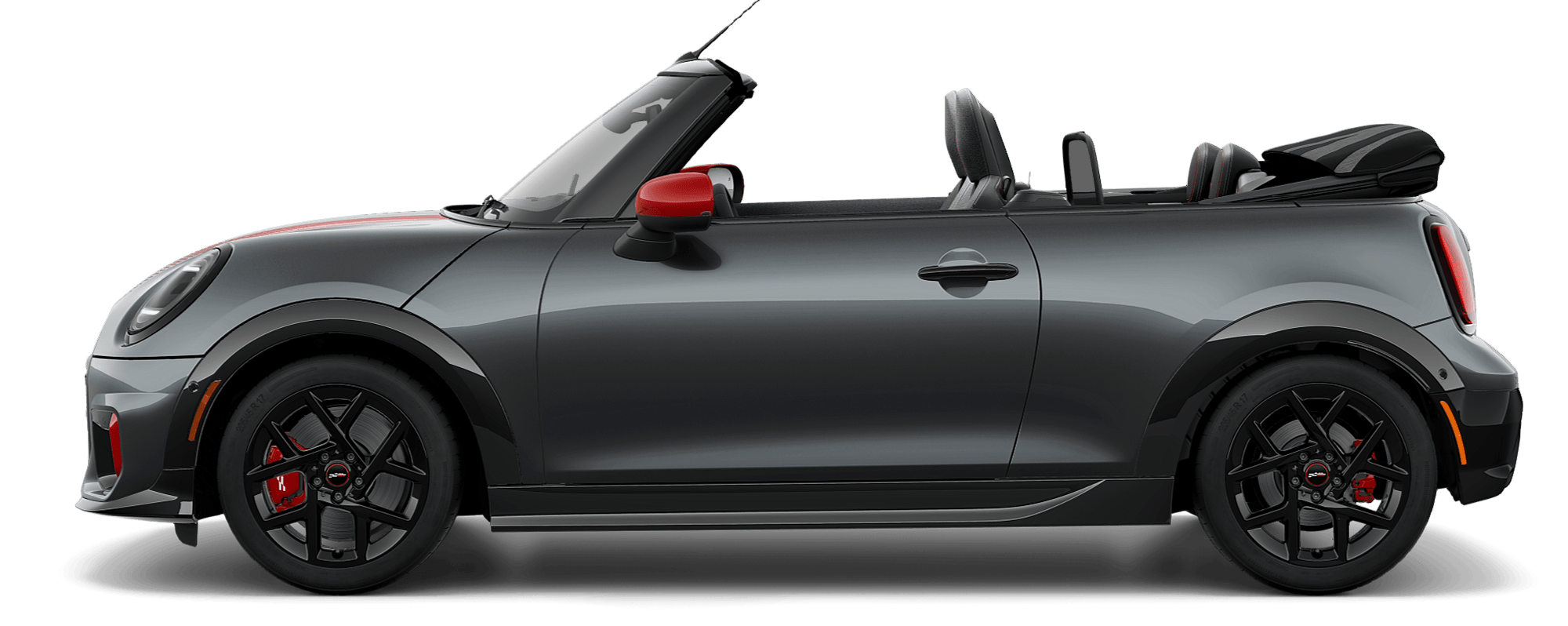 Side view of a MINI JCW Convertible in the Legend Grey body color, facing left with its shadow underneath it. 