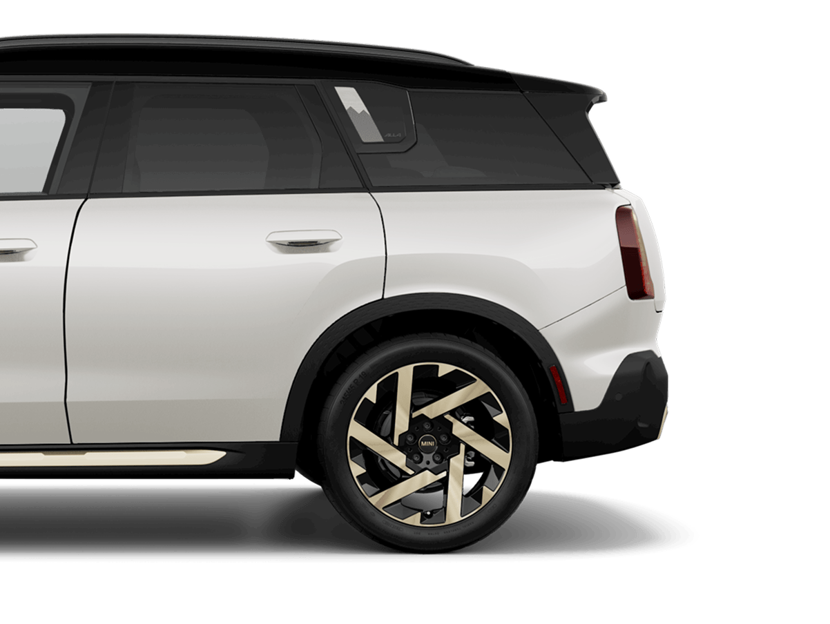 Side-view of a MINI Countryman SE ALL4 cropped from the driver's door to the trunk.